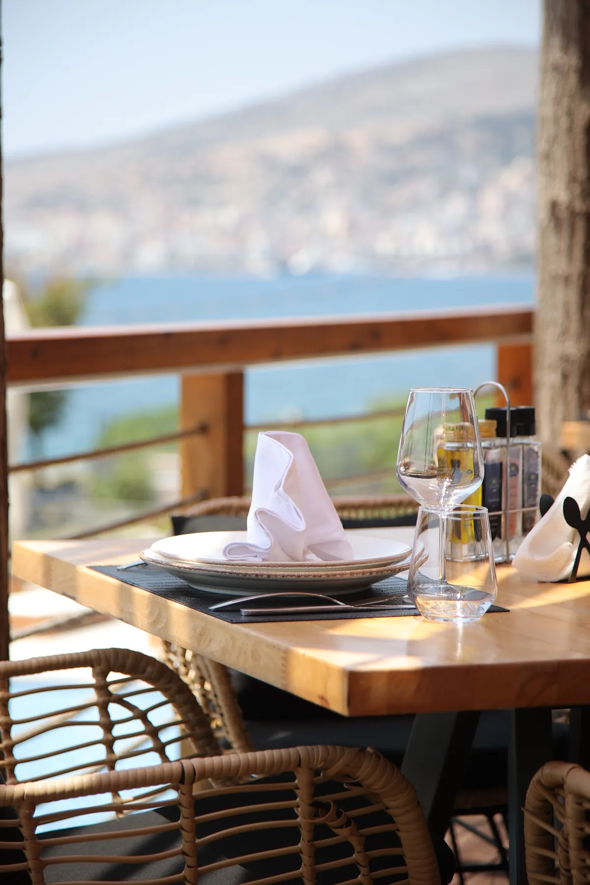 Elegant terrace table setting with a sea view at Harbour Hotel Saranda