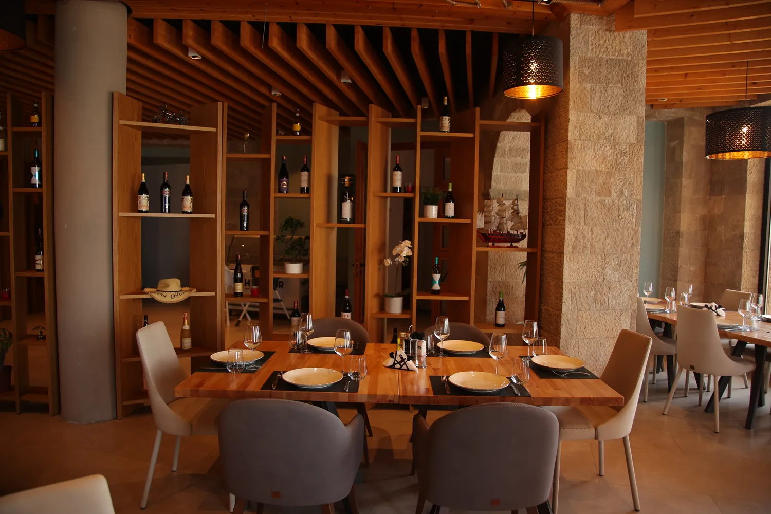 Curated wine selection and nautical decor inside Harbour Hotel Restaurant